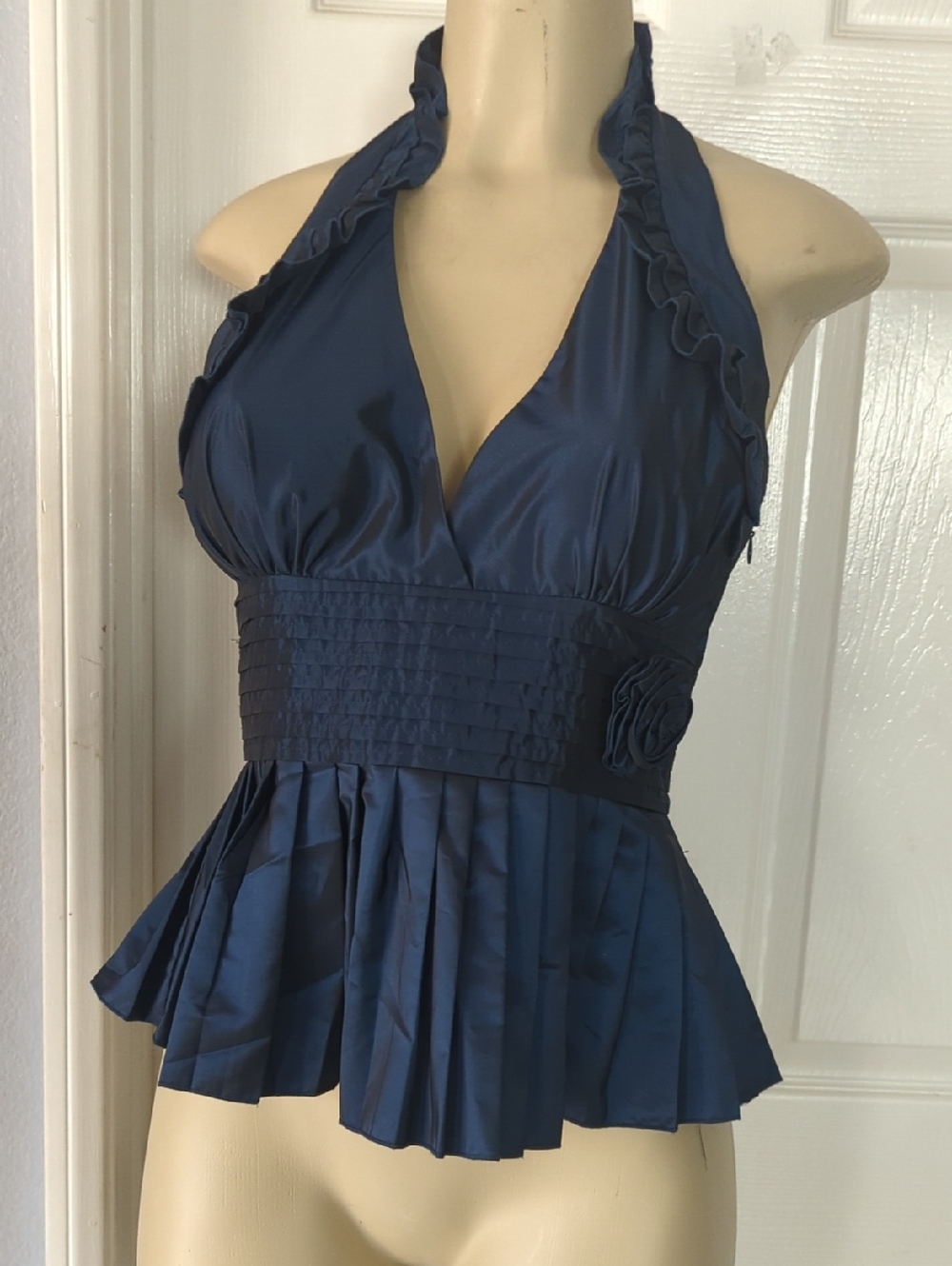 Beautiful bebe Navy Halter Peplum Camisole/ Top. with Smocked Waist and Rosette